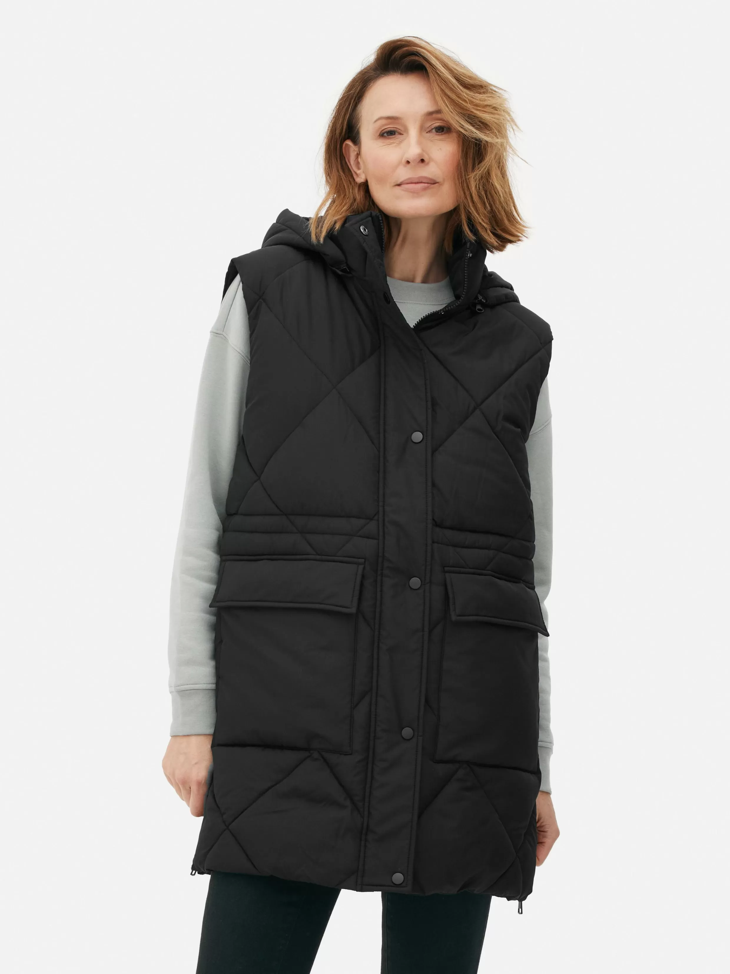 Primark Jassen En Jacks^Lange Pufferbodywarmer Met Capuchon